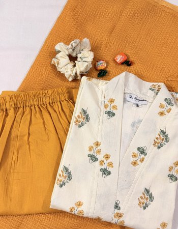 OFF WHITE YELLOW FLOWER BOOTA A LINE KURTI WITH CONTRAST PANTS