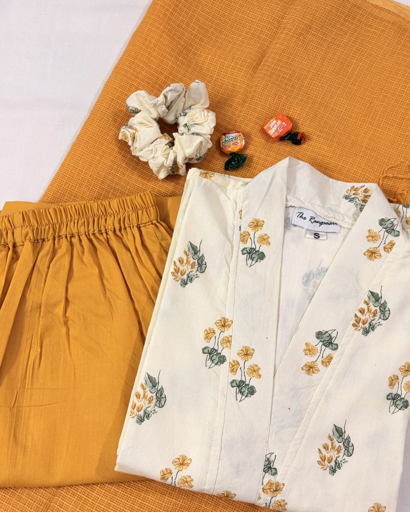 OFF WHITE YELLOW FLOWER BOOTA A LINE KURTI WITH CONTRAST PANTS